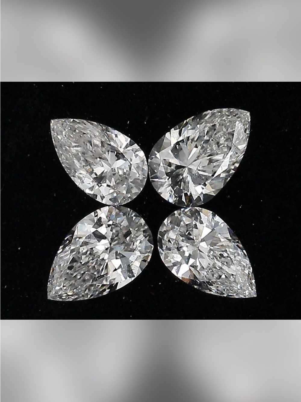 Pear Cut White Diamond Studs - Elegant Women's Jewelry